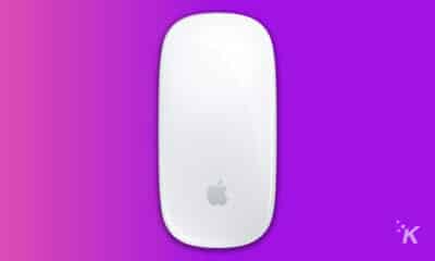 apple magic mouse 2 on purple background