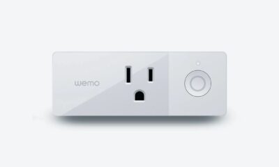 A variety of electronics are connected to power plugs and sockets, with a Wemo jack in the center.