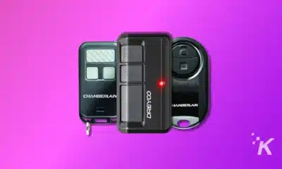 A image showing garage door opener remotes on the purple background